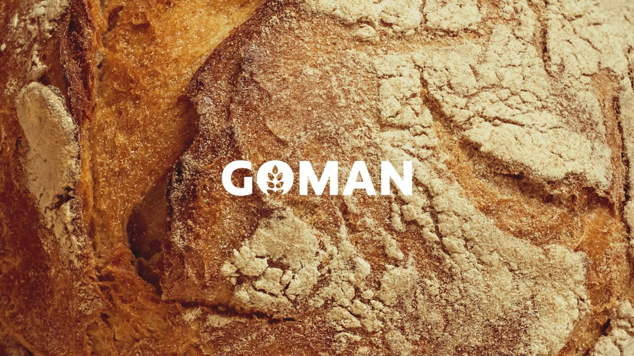 Goman cover med brødbakgrunn